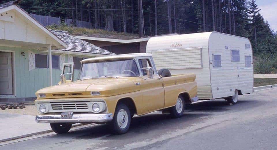 1962 C10 pickup pulling a camp trailer